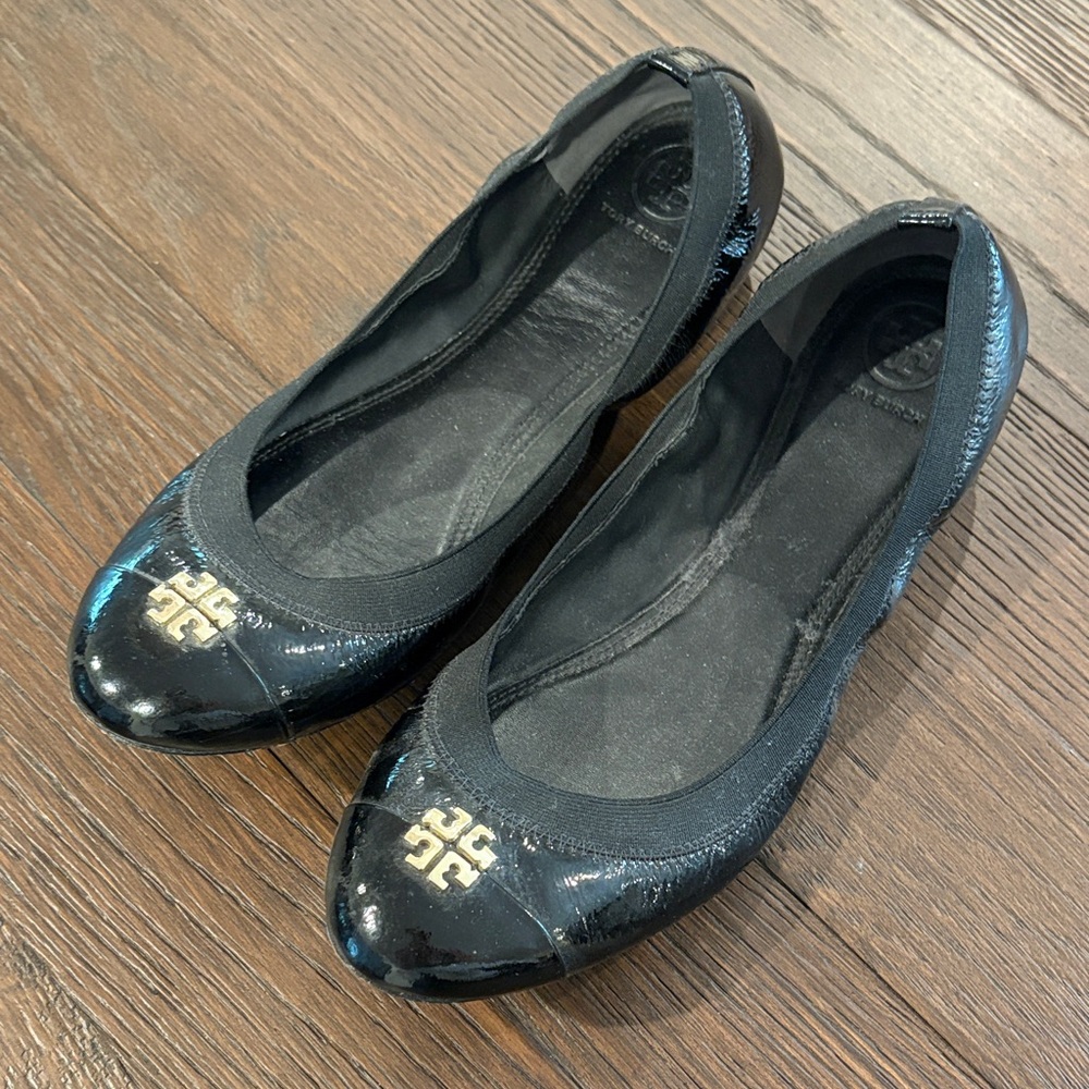 Tory Burch Shiny Black Flats with Gold Logo